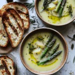 Asparagus and potato soup served with toast